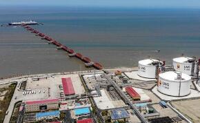 �к��͹��棬�չ�����LNG 2֮10%��Ȩ